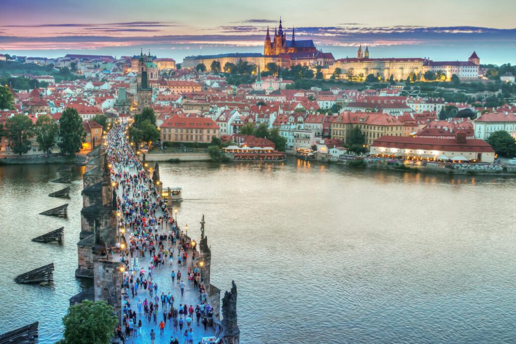 Riverside views of Prague, capturing the river and cathedrals