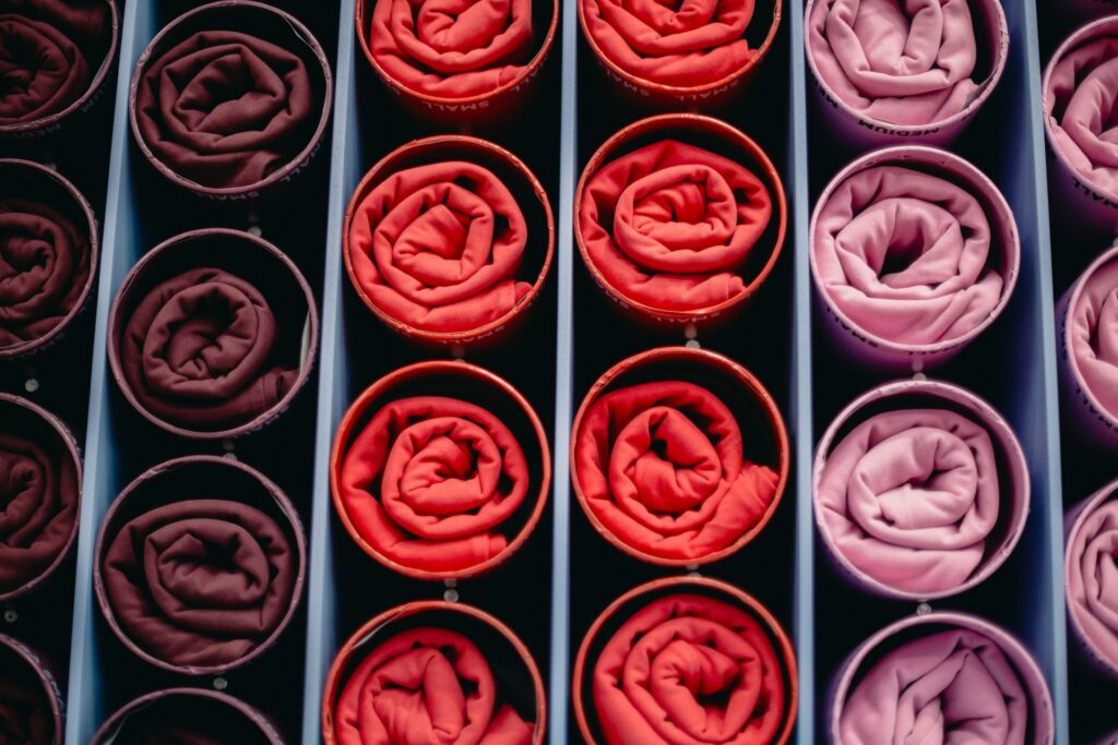 A set of tightly rolled clothes